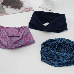 Detailed close-up showing botanical jacquard texture of stretch cotton sports headbands.
