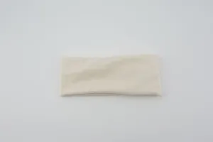 Detailed close-up view of a solid color wide elastic athletic headband soft fabric.