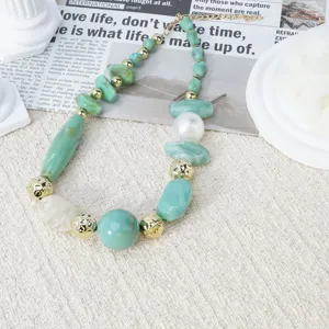 Green resin irregular bead necklace detail close up fashion statement jewelry for women