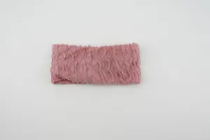 Pink knitted ruffled headband detail, elastic hair accessory for sports yoga daily wear.