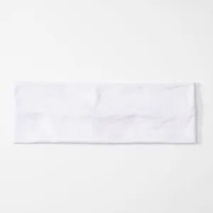 Plain white sports headband detail shot, minimalist elastic sweat absorbent hair accessory.