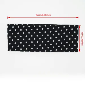 Detailed view of the black and white polka dot stretch knit wide headband, showing dimensions.