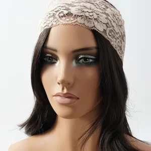 Detail view of wide lace hairband, elegant hollow design, stretchy elastic headband.