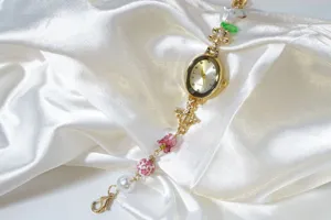 Vintage oval quartz watch with pearl flower beaded bracelet, elegant women gold wristwatch.