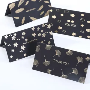Juego de tarjetas de felicitación negras con estampado dorado para el día de la madre.