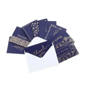 Ensemble de cartes de remerciement bleu et or élégantes avec enveloppe pour vœux.