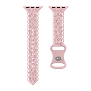 Pink silicone watch band compatible with Apple Watch, featuring scalloped edges and leopard print.