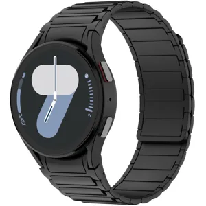 Compatible magnetic silicone smartwatch replacement band in sleek black for daily wear and sports.