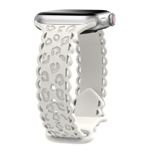 Silicone leopard print watch strap detail, hollow carved lace design, soft replacement band.