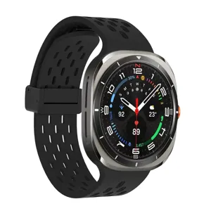 Silicone strap for smartwatch, black magnetic breathable sports band replacement accessory.