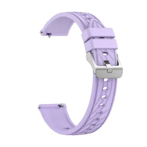 Silicone watch strap detail view, lavender purple band with quick release pin and silver buckle.