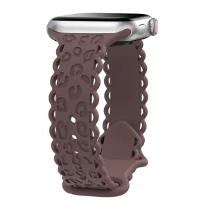 Silicone leopard print watch band detail view, brown cutout strap for smartwatch accessories.