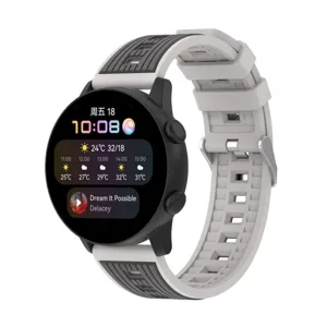 Smartwatch with dual color silicone strap, breathable ventilation holes, round digital display.
