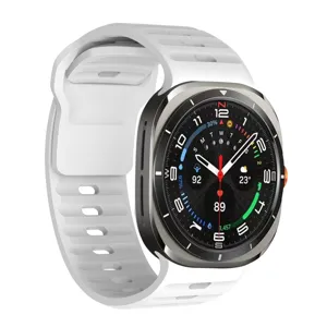 Close-up detail of white silicone smartwatch replacement strap with rugged case texture.