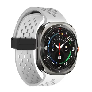 Replacement silicone strap with magnetic buckle for smartwatches, breathable white design.