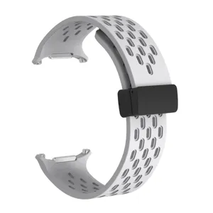 Silicone magnetic watch strap detail, breathable perforated design for smartwatch sports.