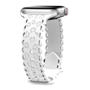 Close-up view of white silicone watch strap featuring hollow lace and leopard print details.