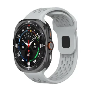 Detailed view of the smartwatch with perforated silicone strap and titanium-colored cushion case.