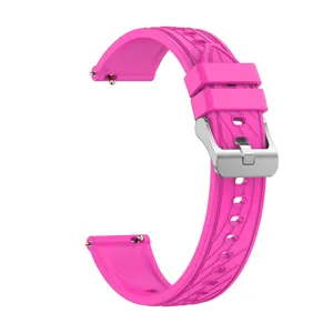 Pink silicone smartwatch replacement strap detail view with metal buckle and quick release pins.