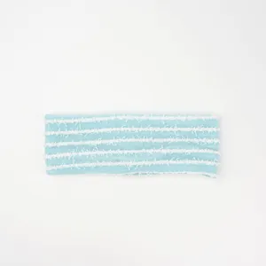 Detailed view of light blue knitted headband with white frayed stripe accents for daily wear.