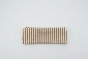Knitted striped wide yoga headband detail shot, comfortable stretchy elastic hair accessory.