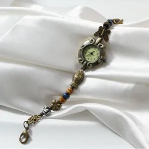 Vintage bronze bead woven bracelet watch for women, retro quartz timepiece with cute charms.