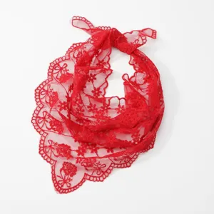 Detailed close-up view of red lace floral embroidered triangle headscarf scalloped edge