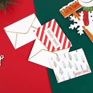 Juego de tarjetas de felicitación navideñas con sobres, tarjetas festivas para celebraciones.