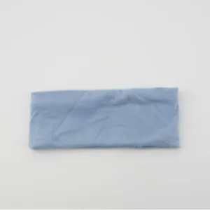 Solid color athletic headband for women, stretchy wide sweatband for fitness and daily wear.