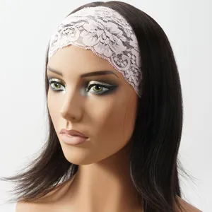 Pink lace headband detail showing delicate hollow floral pattern and stretchy fit for women hair styling.