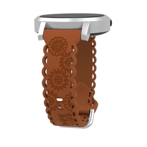 Detail view of brown silicone watch strap featuring sunflower carving and cut-out floral edges.