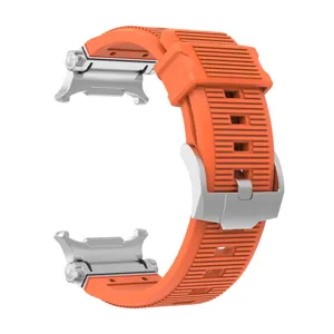Detail view of the vibrant orange silicone watch strap featuring silver metal connectors.