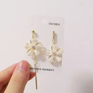 Asymmetric floral tassel earrings with S925 silver needles, elegant and charming style.