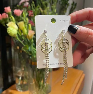 Elegant 925 silver needle rhinestone geometric long tassel earrings for women fashion charm jewelry.