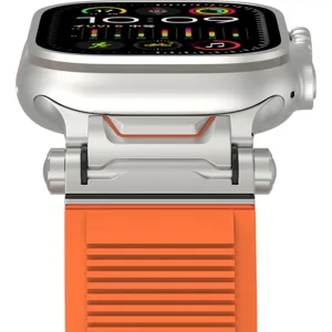 Silicone watch strap close-up showing textured stripes and metallic connector details.