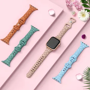 Silicone leopard print watch band compatible with Apple Watch, stylish buckle strap replacement.