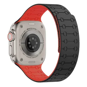 Replacement silicone strap for Apple Watch Ultra, magnetic black and red watchband detail.