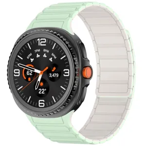 Magnetic silicone watch band replacement strap compatible with smartwatches, dual-tone design.