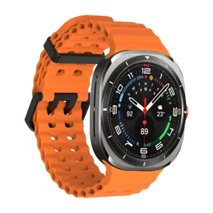 Silicone perforated watch strap compatible with smartwatches, breathable orange band design.