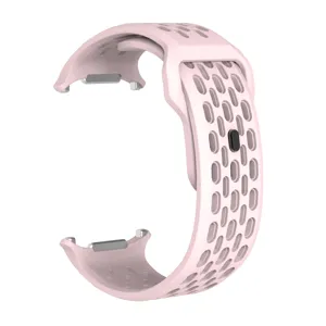 Pink silicone perforated watch band replacement strap with square buckle for smart watch.