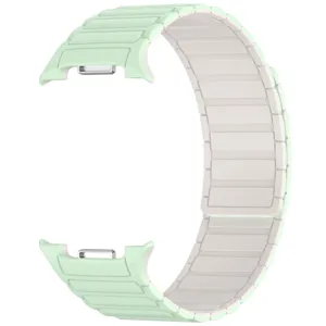 Silicone magnetic watch strap detail showing flexible segment design and clean mint green finish.
