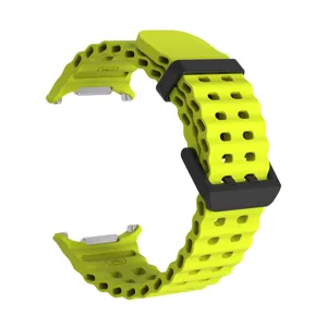 Detailed view of the yellow silicone smartwatch strap with breathable holes and black clasp.
