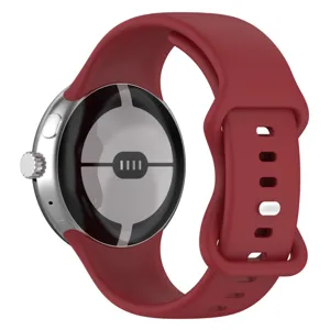 Silicone replacement watch band detail showing the vibrant red color, secure buckle, and fit.
