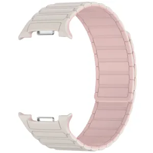 Silicone magnetic watch band compatible with smartwatch, dual-tone beige and pink design.