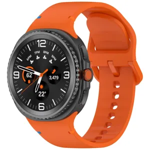 Silicone smartwatch replacement band in bright orange color with flat stitching and durable clasp.