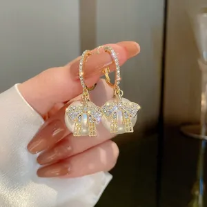 Elegant gold-plated rhinestone bow pearl hoop earrings for women, stylish dangle gift.