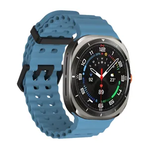 Close-up detail of the breathable blue silicone watch strap with double black buckles.
