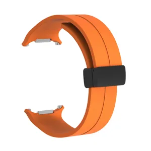 Orange silicone magnetic watch strap detail, comfortable fit for smart watch replacement accessory.