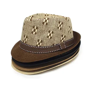 Detail view of men's summer straw fedora hat featuring geometric patterned crown and striped band.