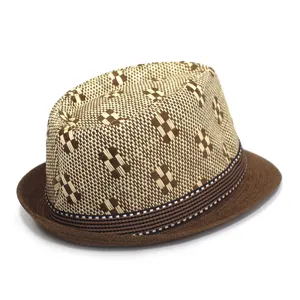 Detailed view of men straw fedora hat, summer sun protection beach hat with checkered weave design.